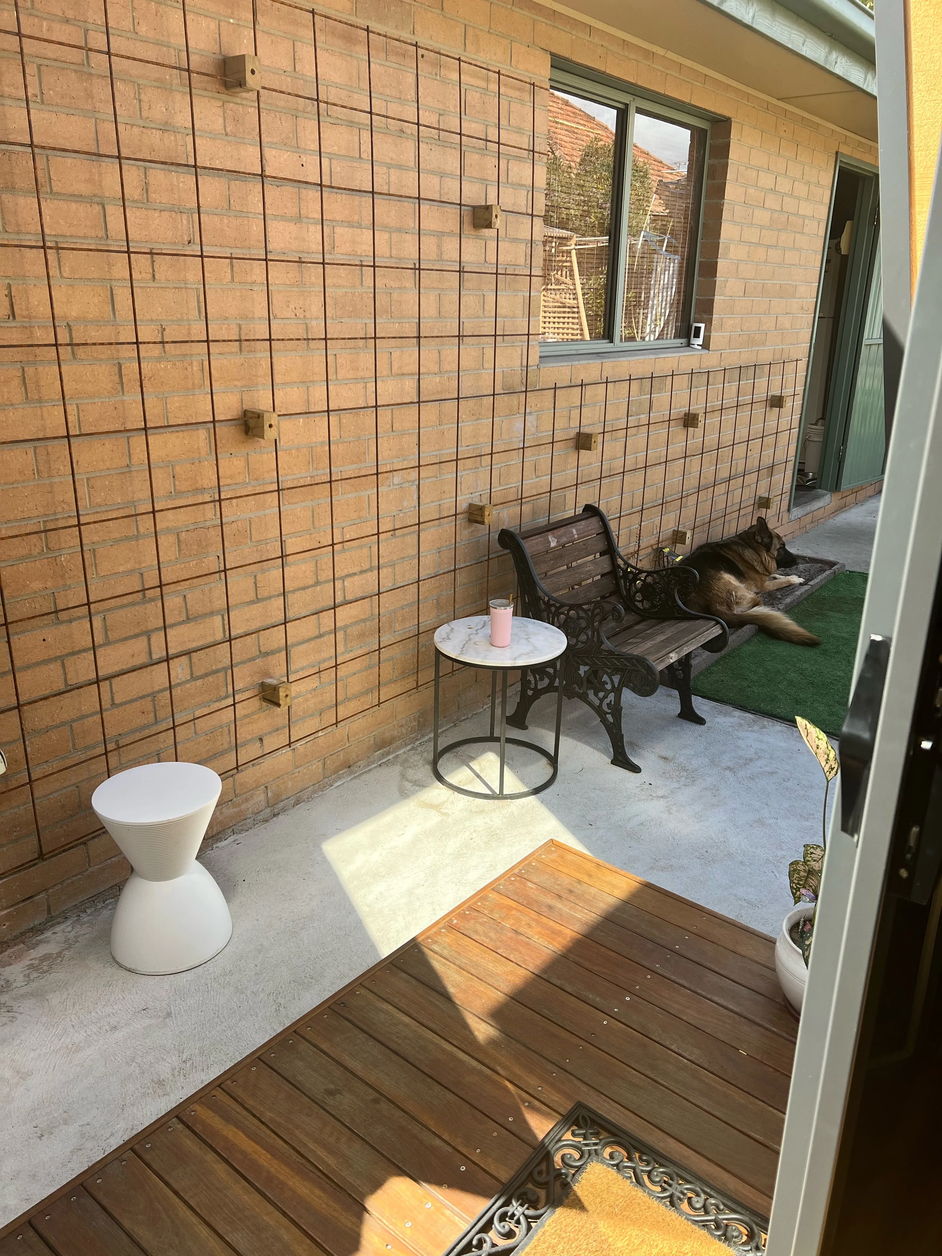 Private courtyard and timber deck at the Vanish studio entrance