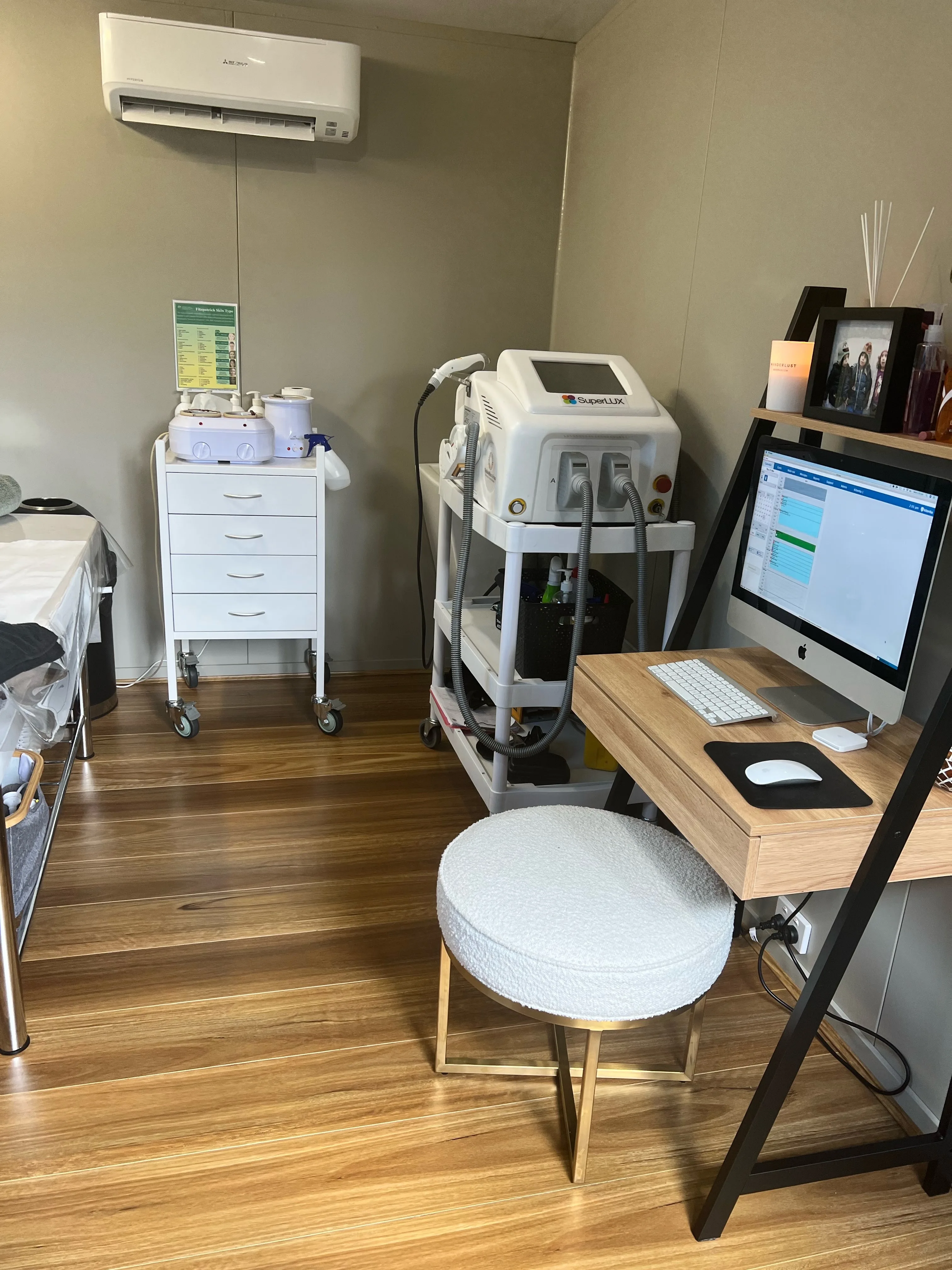SuperLUX IPL/SHR device and wax-warmer workstation in the Vanish treatment room